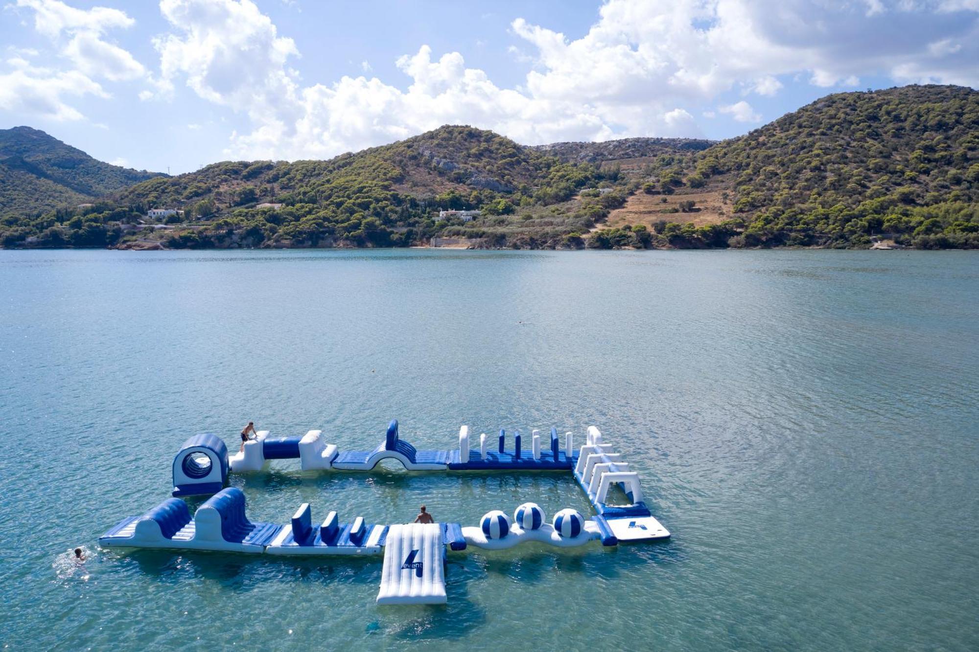 Dolce By Wyndham Athens Attica Riviera Hotel Vravrona Exterior photo The water park at the lake